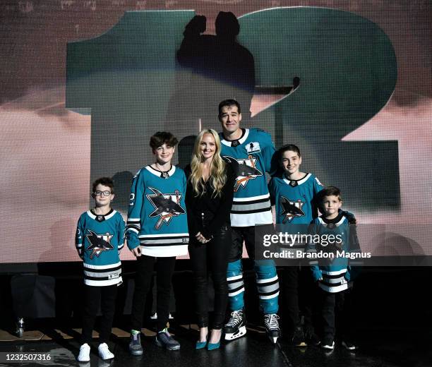 Patrick Marleau of the San Jose Sharks and his family poses as he is honored for having passed Gordie Howe on the NHLs all-time games played list...