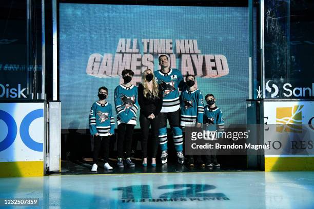 Patrick Marleau of the San Jose Sharks and his family look up at the video board as he is honored for having passed Gordie Howe on the NHLs all-time...