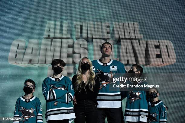 Patrick Marleau of the San Jose Sharks and his family look up at the video board as he is honored for having passed Gordie Howe on the NHLs all-time...