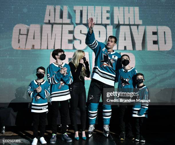 Patrick Marleau of the San Jose Sharks and his family wave to the crowd as he is honored for having passed Gordie Howe on the NHLs all-time games...