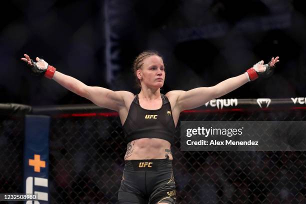 Valentina Shevchenko of Kyrgystan celebrates after beating Jessica Andrade of Brazil during the Womens Flyweight Title bout of UFC 261 at VyStar...