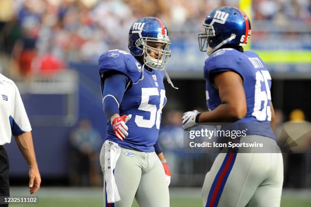 New York Giants linebacker Antonio Pierce and offensive tackle William Beatty during the Giants 23-17 win over the Redskins at Giants Stadium in East...