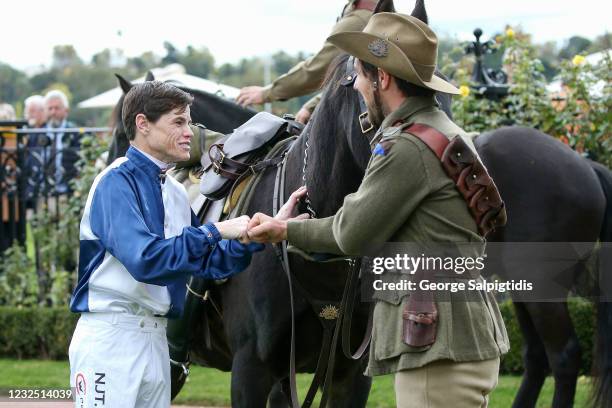 The Anzac Day commemorative ceremony held in the mounting yard before RAAF Centenary at Flemington Racecourse on April 25, 2021 in Flemington,...