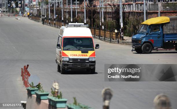 An ambulance moves during curfew in Srinagar, Kashmir on April 25, 2021. As the COVID-19 cases continue to rise the authorities imposed strict Corona...