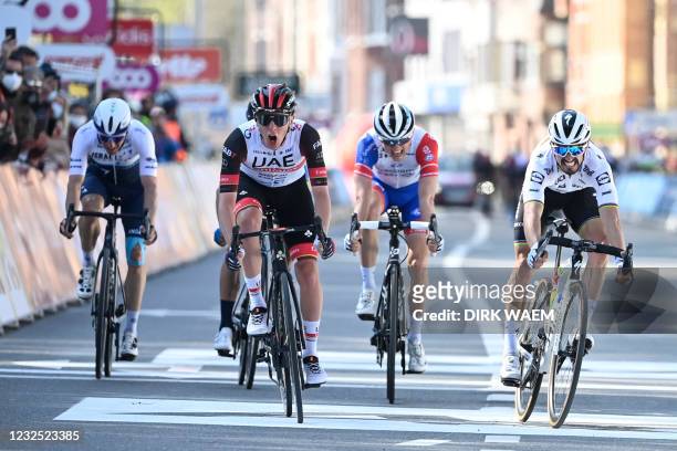 Slovenian Tadej Pogacar of UAE Team Emirates and French Julian Alaphilippe of Deceuninck - Quick-Step sprint to the finish of the...