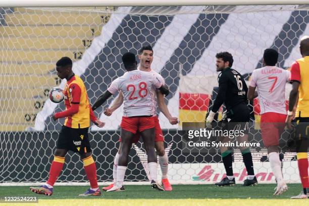 Zinedine Ferhat of Nimes Olympique celebrates after scoring his team's first goal during the Ligue 1 match between RC Lens and Nimes Olympique at...