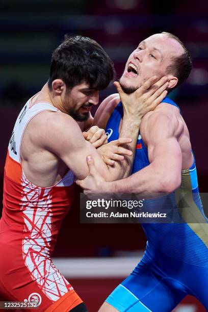 Kerem Kamal from Turkey fights with Sergey Emelin from Russia at the Final Greco-Roman Wrestling 60 kg weight during 2021 Senior European...