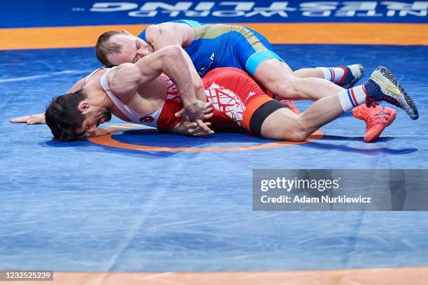 Kerem Kamal from Turkey fights with Sergey Emelin from Russia at the Final Greco-Roman Wrestling 60 kg weight during 2021 Senior European...