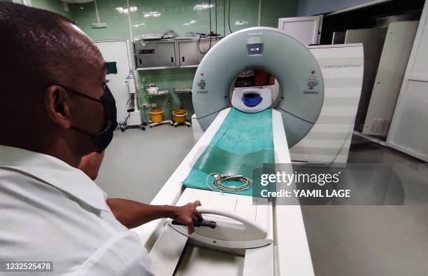 Doctor is seen at the Ernesto Che Guevara Cardio Center hospital in Santa Clara, Villa Clara Province, Cuba, on April 25, 2021. -