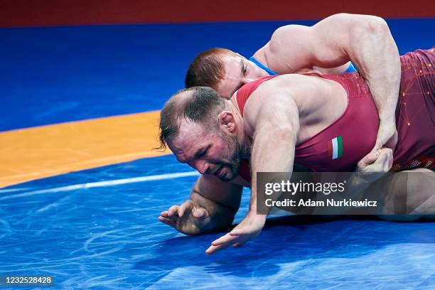 Balazs Kiss from Hungary fights with Musa Evloev from Russia at Final Greco-Roman Wrestling 97 kg weight during 2021 Senior European Championships...