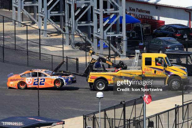 Joey Logano, Team Penske, Ford Mustang Autotrader is pulled to the garage on a tow truck after a wreck during the running of the 52nd Annual Geico...