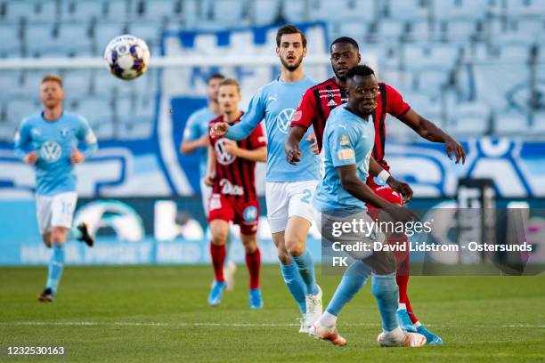 Isak Ssewankambo of Ostersunds FK and Bonke Innocent of Malmo FF during the Allsvenskan match between Malmo FF and Ostersunds FK at Eleda Stadion on...