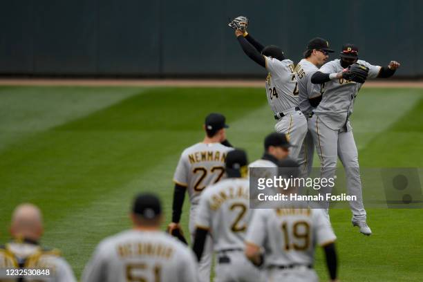 The Pittsburgh Pirates celebrate defeating the Minnesota Twins after the game at Target Field on April 25, 2021 in Minneapolis, Minnesota. The...