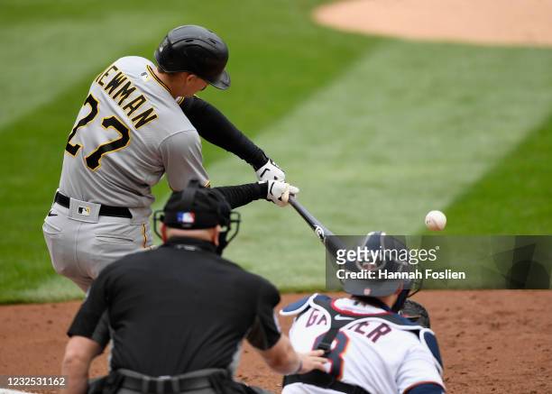 Kevin Newman of the Pittsburgh Pirates hits an RBI single against the Minnesota Twins during the eighth inning of the game at Target Field on April...