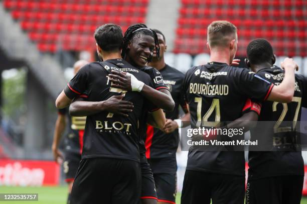 Martin Terrier of Rennes jubilates with Eduardo Camavinga as he scores his sideÕs first goal during the Ligue 1 match between Stade Rennes and Dijon...