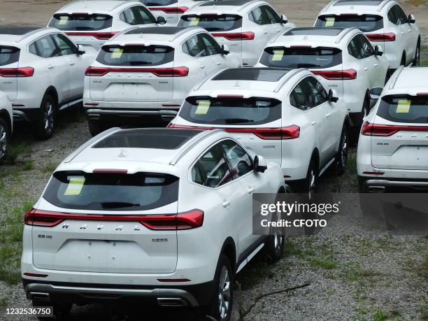 Great Wall cars are sold by merchants on a street in Yichang, Hubei province, China, April 26, 2021.
