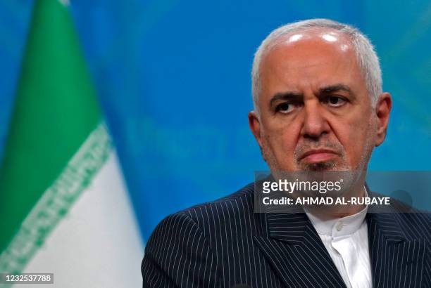 Iran's Foreign Minister Mohammad Javad Zarif looks on during a joint press conference with his Iraqi counterpart in Iraq's capital Baghdad on April...