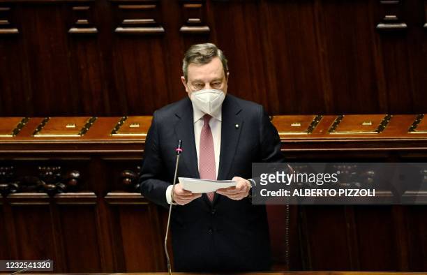 Italian Prime Minister Mario Draghi addresses deputies in the Italian Parliament on April 26, 2021 at Montecitorio Palace in Rome as he presents...