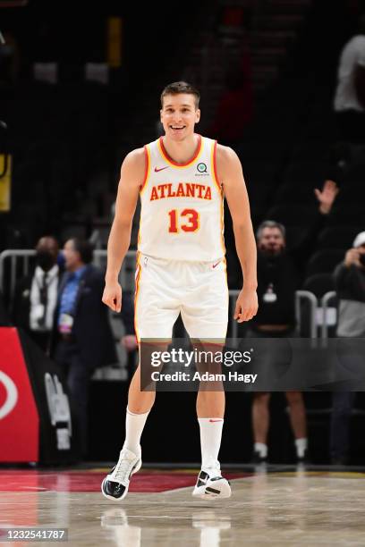 Bogdan Bogdanovic of the Atlanta Hawks smiles during the game against the Milwaukee Bucks on April 25, 2021 at State Farm Arena in Atlanta, Georgia....