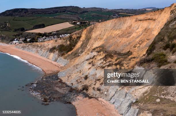 An overhead view shows the scene of a coastal cliff fall on Dorset's Jurassic Coast near the village of Seatown, on the south west coast of England...