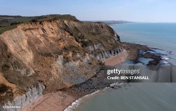 An overhead view shows the scene of a coastal cliff fall on Dorset's Jurassic Coast near the village of Seatown, on the south west coast of England...