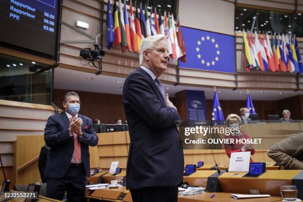 Head of the Task Force for Relations with the UK, Michel Barnier , flanked by European Commission President Ursula von der Leyen , gestures during...