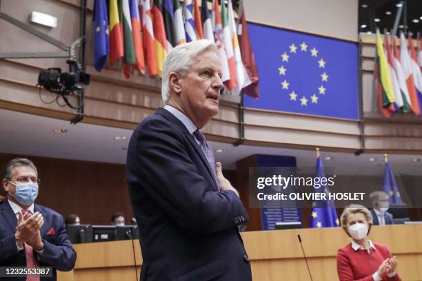 Head of the Task Force for Relations with the UK, Michel Barnier , flanked by European Commission President Ursula von der Leyen gestures during the...