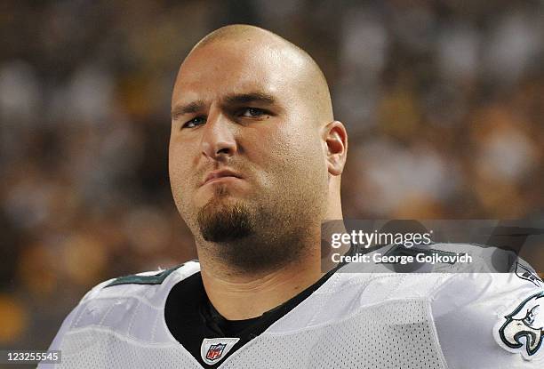 Offensive lineman Mike McGlynn of the Philadelphia Eagles looks on from the sideline during a preseason game against the Pittsburgh Steelers at Heinz...