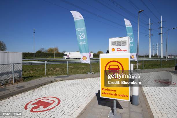 Empty electric vehicle charging bays at a Royal Dutch Shell Plc gas station in Rotterdam, Netherlands, on Tuesday, April 27, 2021. Shell reports...