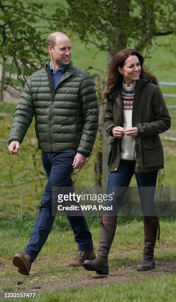 Prince William, Duke of Cambridge and Catherine, Duchess of Cambridge walk together during their visit to Manor Farm in Little Stainton, Durham on...