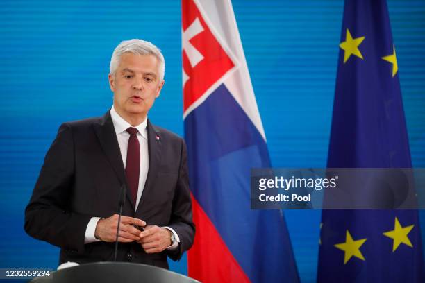 Slovakian Foreign Minister Ivan Korcok attends a news conference with his counterpart from Germany Heiko Maas prior to a meeting at the foreign...