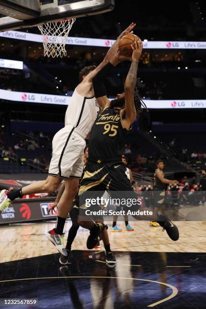 DeAndre' Bembry of the Toronto Raptors shoots the ball during the game against the Brooklyn Nets on April 27, 2021 at Amalie Arena in Tampa, Florida....