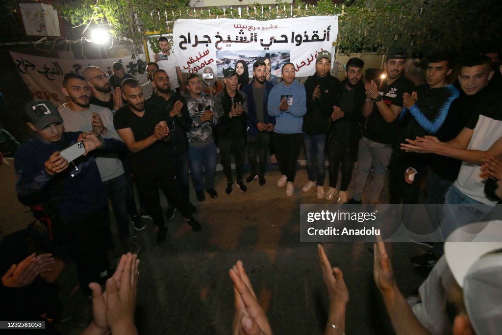Palestinian families gather for a demonstration in Jerusalem
