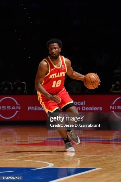 Solomon Hill of the Atlanta Hawks handles the ball against the Philadelphia 76ers on April 28, 2021 at Wells Fargo Center in Philadelphia,...
