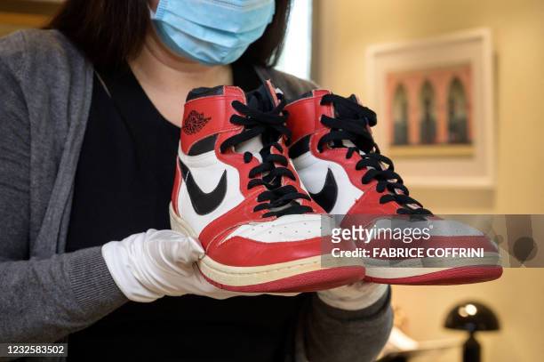 Pair of basketball legend Michael Jordan's famous Air Jordans from his rookie season are seen on April 28, 2021 in Geneva during a preview of sale by...