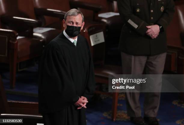 Chief Justice of the US Supreme Court John Roberts arrives before a speech by President Joe Biden to a joint session of Congress in the House chamber...