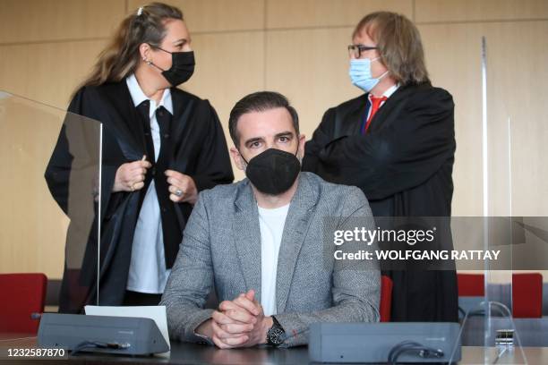 German former soccer player Christoph Metzelder looks on before the beginning of his trial at a regional court in Duesseldorf, western Germany, April...