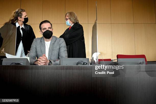 Defendant Former professional football player Christoph Metzelder and his attorneys arrive in the courtroom for the first day of his trial on charges...
