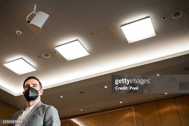 Defendant Former professional football player Christoph Metzelder arrives in the courtroom for the first day of his trial on charges of possessing...