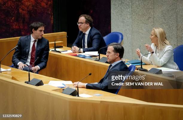 Outgoing Minister of Financial Affairs Wopke Hoekstra, outgoing Minister of Social Affairs Wouter Koolmees, outgoing Prime Minister Mark Rutte and...