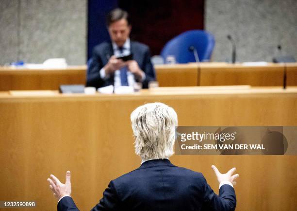 Outgoing Prime Minister Mark Rutte and rightwing populist PVV-leader Geert Wilders during a new debate about the 'benefits affair' in the House of...