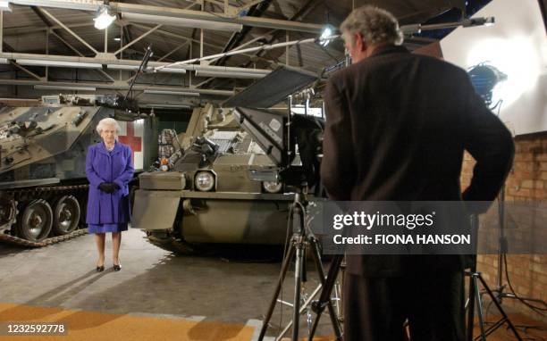 Britain Queen Elizabeth II records her broadcast to the Commonwealth at Combermere Barracks in Windsor 08 December 2003. The broadcast is the first...