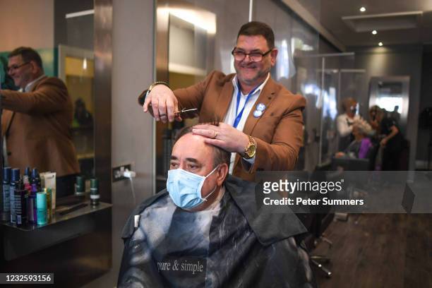 Alex Salmond, leader of the Alba party, is seen in a barber's while campaigning on April 29, 2021 in Greenock, Scotland. Scotland heads to the polls...