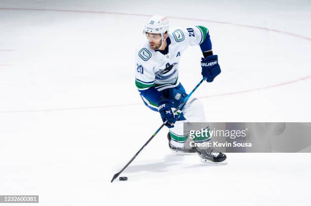 Brandon Sutter of the Vancouver Canucks plays the puck against the Toronto Maple Leafs during the first period at the Scotiabank Arena on April 29,...