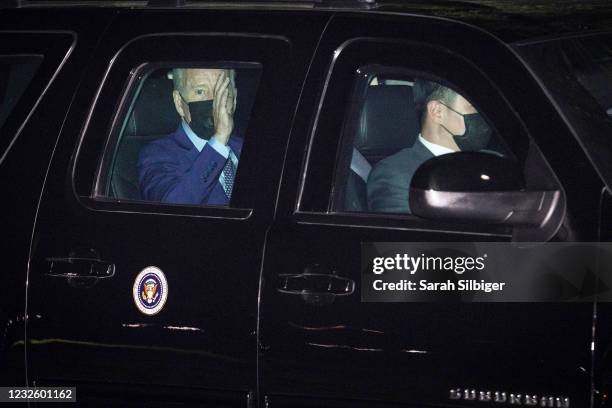 President Joe Biden and First Lady Jill Biden ride in a motorcade from the Ellipse to the White House on April 29, 2021 in Washington, DC. President...