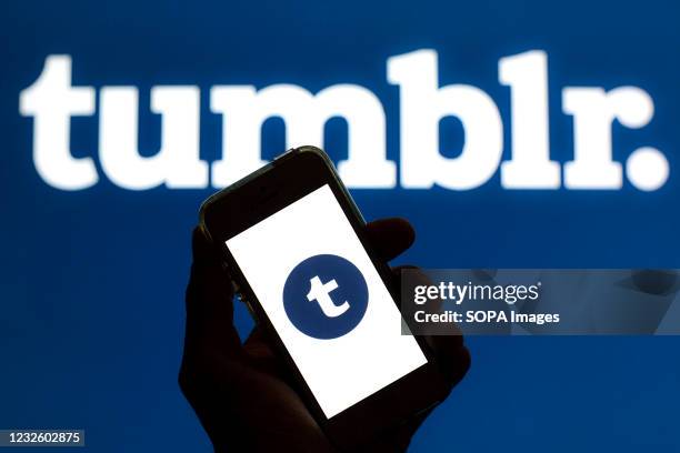 In this photo illustration a Tumblr logo in App Store seen displayed on a smartphone screen with a Tumblr logo in the background.