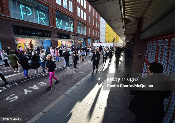 Thousands of shoppers wait for Primark to open for the first time since the latest lockdown on April 30, 2021 in Belfast, Northern Ireland. Non...