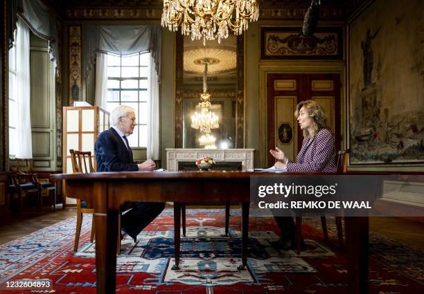 Minister of State and Informateur Herman Tjeenk Willink readies to hand over his final report to President of the House of Representatives Vera...