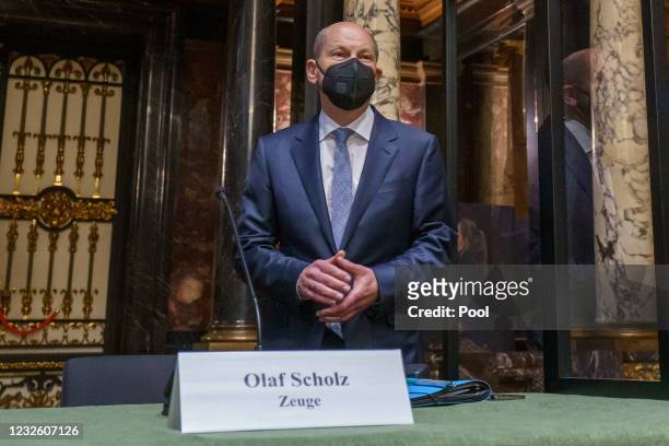 German Finance Minster and chancellor candidate of the German Social Democrats Olaf Scholz arrives to testify at the Hamburg state parliamentary...