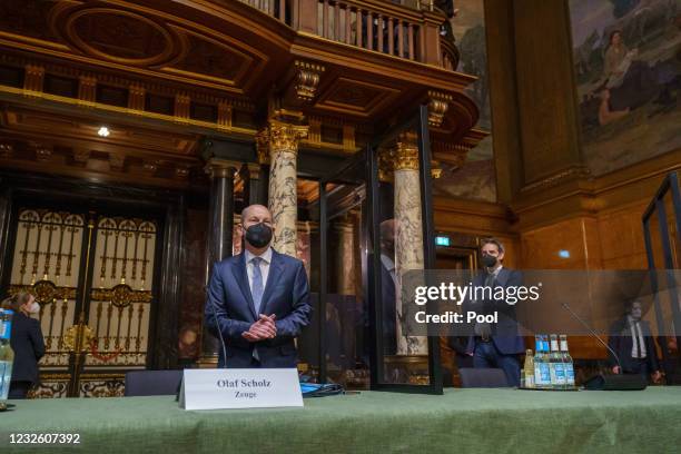 German Finance Minster and chancellor candidate of the German Social Democrats Olaf Scholz arrives to testify at the Hamburg state parliamentary...